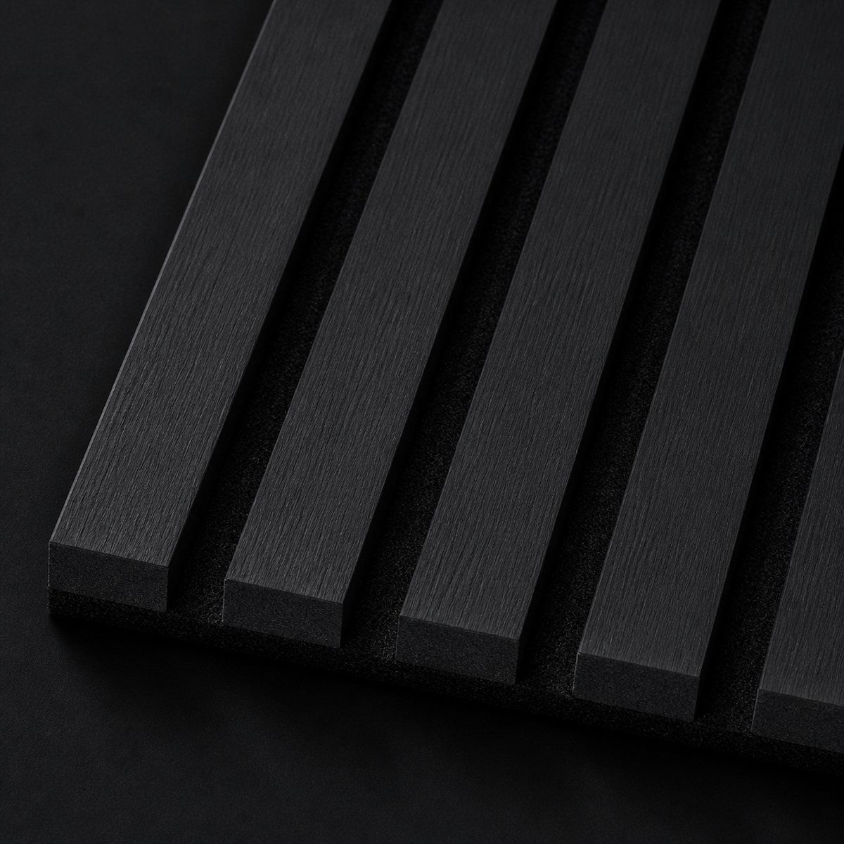 Black acoustic wall panel slat and felt close-up