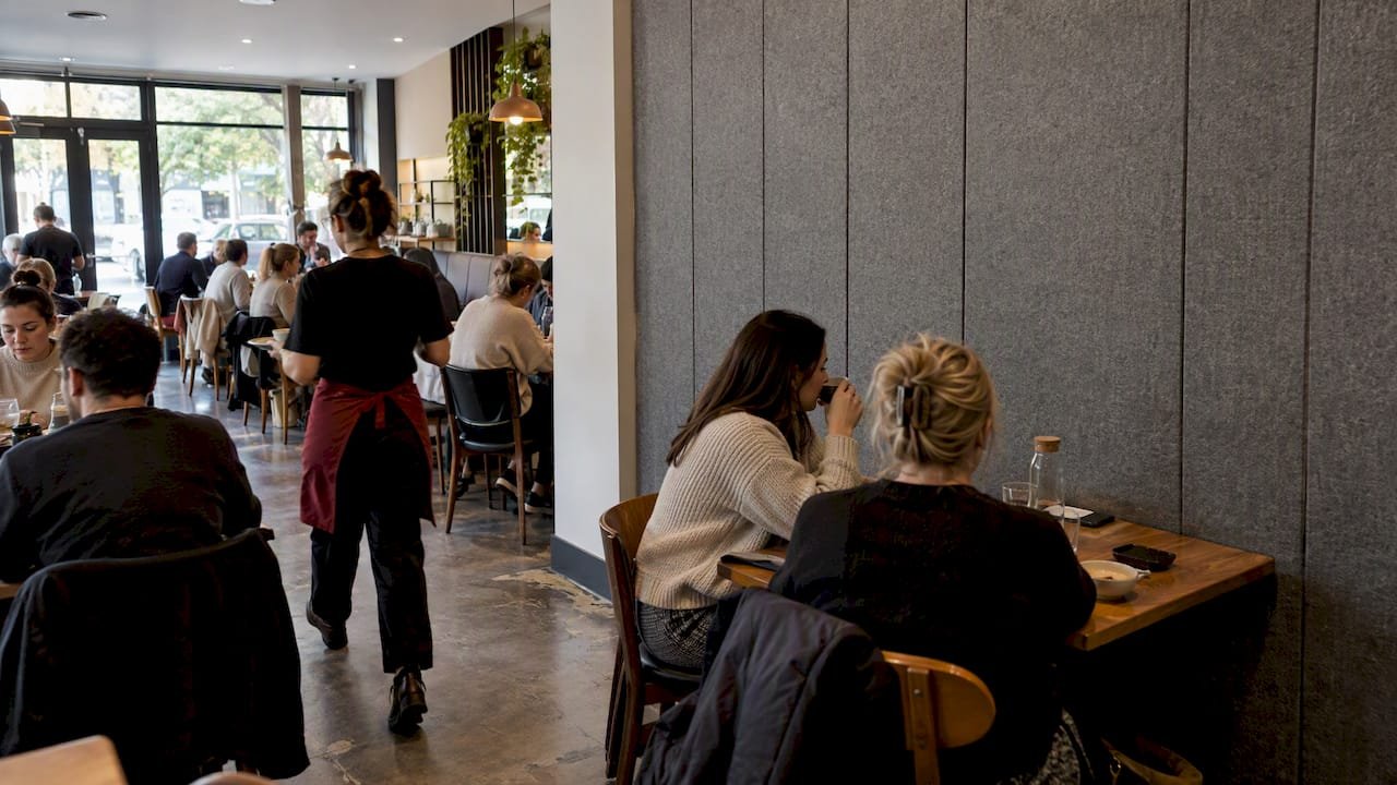 Mid-tone felt acoustic panel in busy café